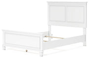 Fortman bedroom set by Ashley Furniture with coordinated bed, dresser, and nightstand in a warm wood finish