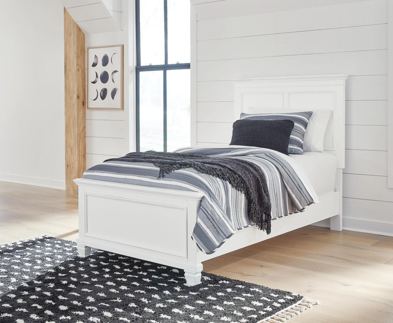 Ashley Furniture Fortman bedroom set with bed, dresser, mirror, and nightstand in dark finish