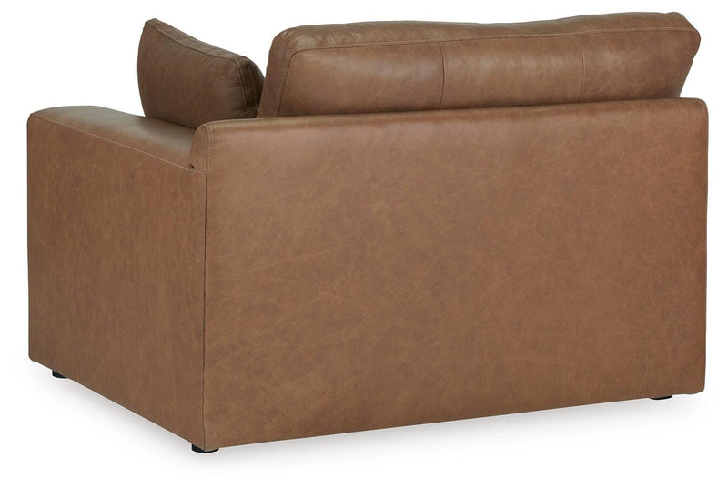 Ashley Furniture Emilia sectional sofa with plush seating and chaise lounge in a contemporary design